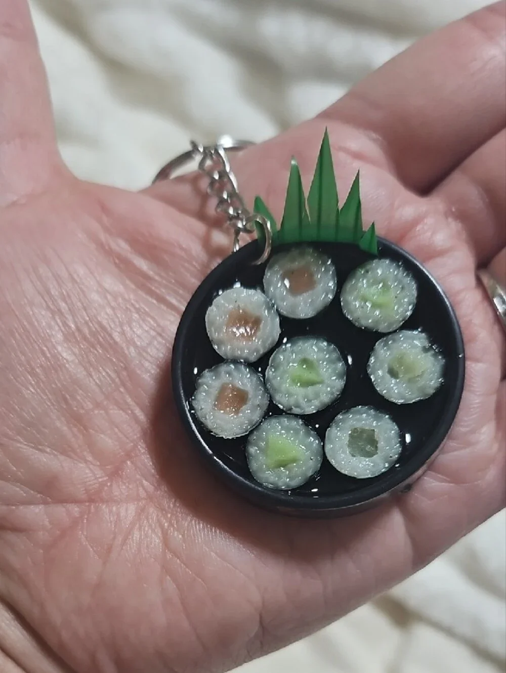 Source Unknown Black Sushi Roll Keychain with Green Accent